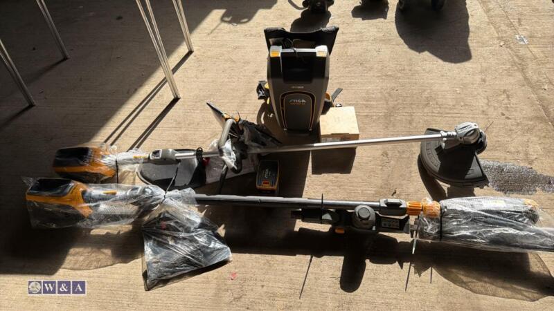 2 x STIGA SBC500AE strimmers (unused), STIGA E POWER SBH 900AE power backpack, 2 x batteries & fast charger