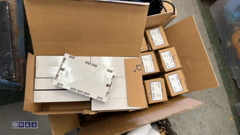 Tray of electrical spares including back boxes & trip switches etc