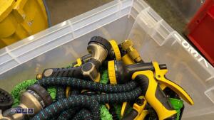 Box of expandable garden hoses, spray guns - 2