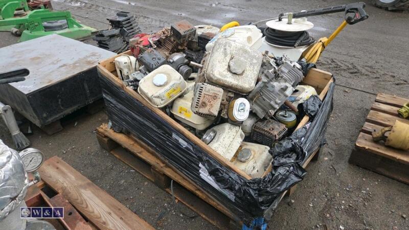 Crate of petrol engine spares