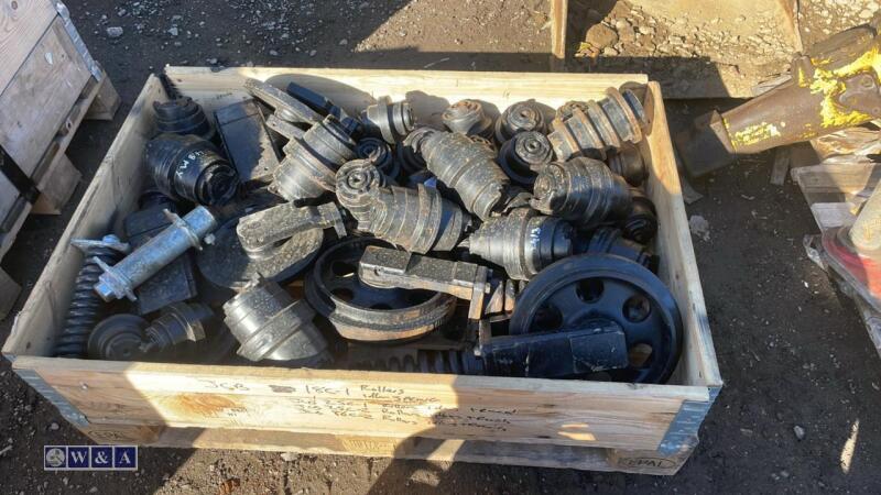 Crate of excavator rollers
