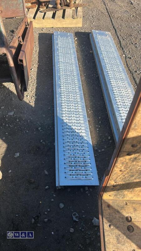 Pair of metal loading ramps