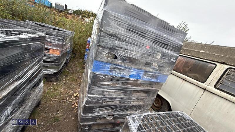 Stack of plastic pallets