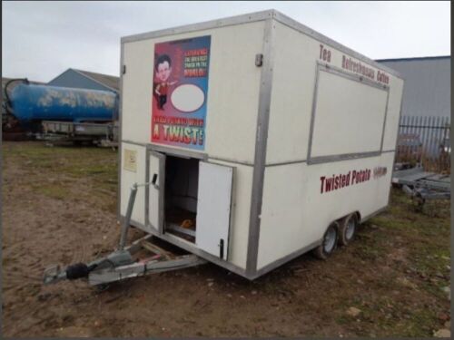 12 x 6 catering unit c/w electric hookup, propane gas, & rear/side opening.