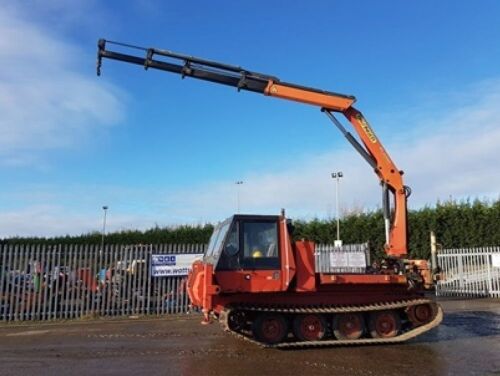 FOREMOST Nodwell 60C 10t tracked crane carrier with PALFINGER PK1200 crane, hand books and stillage of mixed spares