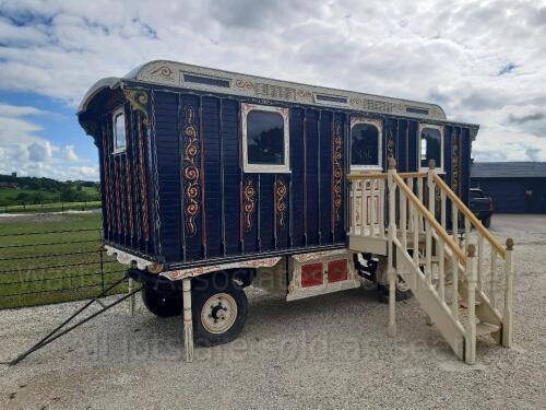 (TO BE SOLD IN SITU at WF4) (Viewings available) Showmans Living Wagon believed to be manufactured Circa 1908 to 1913 by FJ THOMAS OF CHERTSEY c/w mollycroft roof, separate bedroom & slide out bed for children, internal gimble lights, wood burning stove a