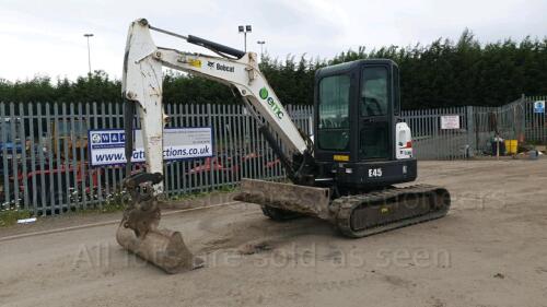 2012 BOBCAT E45EM rubber tracked excavator S/n: AHHC12407 with bucket, blade, piped & Q/hitch (All hour and odometer readings are unverified and unwarranted)