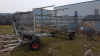 4-wheeled galvanised pipe carrier trailer