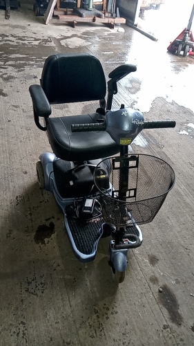 Mobility scooter (charger in office)