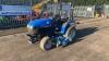 2012 NEW HOLLAND TC24D 4wd hydrostatic compact tractor c/w 4' mid mount deck, 3-point linkage & PTO (FX12 EZM)(V5 in office) - 2