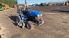 2012 NEW HOLLAND TC24D 4wd hydrostatic compact tractor c/w 4' mid mount deck, 3-point linkage & PTO (FX12 EZM)(V5 in office) - 4