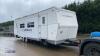 American make-up twin axle trailer c/w slide out room