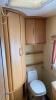 2002 ABBEY SPECTRUM caravan c/w full size awning, fixed bed pull out, double bed at the front, toilet, shower, cooker, fridge (keys in office) - 36