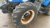 2007 NEW HOLLAND TL100A 4wd tractor, A/C, air seat, 3 x spool valves (CN57 DMX) c/w McCONNELL PA48 flail hedge cutter, McCONNELL ditching attachment, & 4 x spare wheels with turf tyres (V5 & Manuals in office) - 11