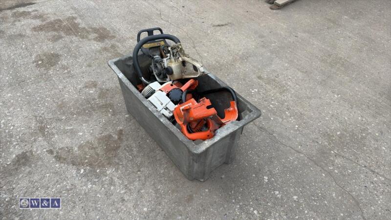 Box of chainsaw parts